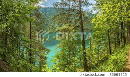 Panoramic view over lake Weissensee in Austria in summer during daytime Panoramic view over lake Weissensee in Austria in summer during daytime 86665235