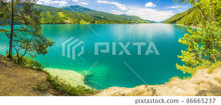 Panoramic view over lake Weissensee in Austria in summer during daytime 86665237