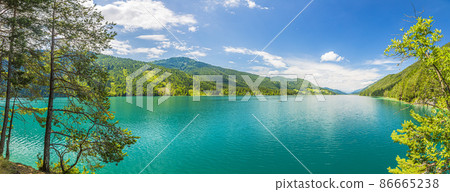 Panoramic view over lake Weissensee in Austria in summer during daytime 86665238