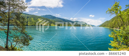 Panoramic view over lake Weissensee in Austria in summer during daytime 86665240
