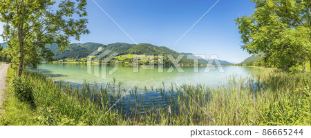 Panoramic view over lake Weissensee in Austria in summer during daytime 86665244
