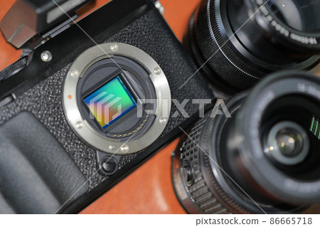 A black camera without a lens can be seen inside A black camera without a lens can be seen inside 86665718