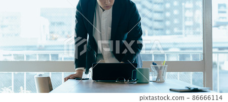 A man suffering from work A man suffering from work 86666114