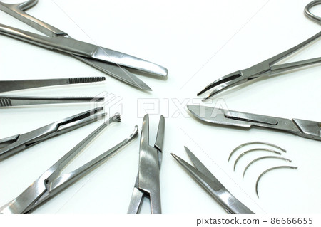 Surgical Instruments Isolated on the White Background Surgical Instruments Isolated on the White Background 86666655