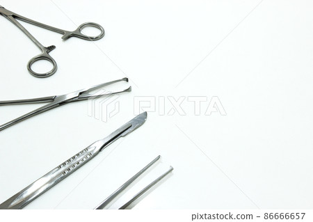 Surgical Instruments Isolated on the White Background Surgical Instruments Isolated on the White Background 86666657