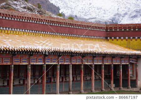 A prayer wheel in Langmusi, Amdo, Tibet A prayer wheel in Langmusi, Amdo, Tibet 86667197