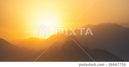 natural landscape - misty mountains at sunset natural landscape - misty mountains at sunset 86667756