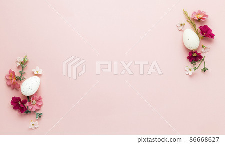 Easter holiday pink mockup background. Top view from above to white Easter eggs, different colorful flowers, frame border. Card with copy space to place text. Minimal flat lay. High quality photo Easter holiday pink mockup background. Top view from above to white Easter eggs, different colorful flowers, frame border. Card with copy space to place text. Minimal flat lay. High quality photo 86668627