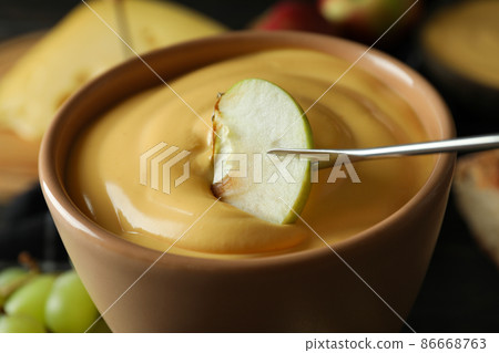 Concept of delicious food with fondue, close up 86668763