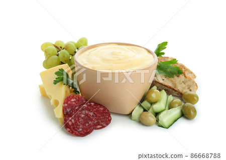 Tasty cheese fondue isolated on white background Tasty cheese fondue isolated on white background 86668788