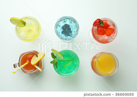 Set of fresh cocktails on white background 86669089
