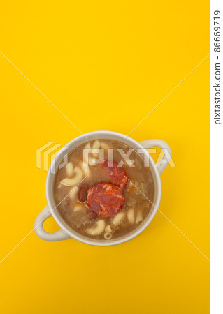 typical portuguese soup with smoked sausages and meat 86669719