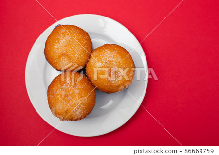 typical portuguese dessert bolo de arroz on plate 86669759