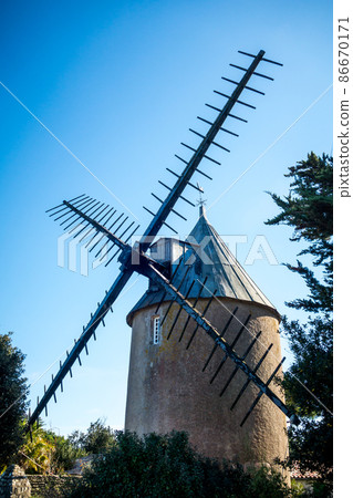 Old traditional windmill in Re island Old traditional windmill in Re island 86670171