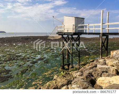 Traditional fishing cabin and net - Carrelet - Saint Georges de Didonne, France 86670177