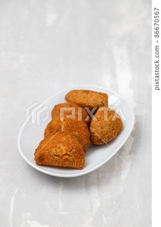 typical portuguese appetizer on small white dish 86670567