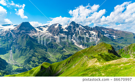 Beautiful alpine peak on sunny summer day Beautiful alpine peak on sunny summer day 86670997