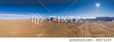 Aerial view of the spectacular stone towers of Monument Valley in winter Aerial view of the spectacular stone towers of Monument Valley in winter 86671254