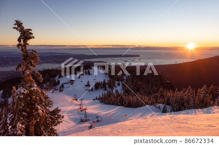 View of Top of Grouse Mountain Ski Resort with the City in the background. 86672334