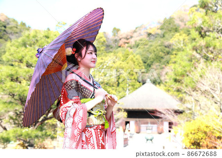 Pre-adult shooting Japanese kimono location shooting in Japanese location, Japanese woman in red furisode Pre-adult shooting Japanese kimono location shooting in Japanese location, Japanese woman in red furisode 86672688