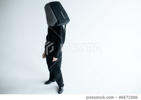 stylish hipster person holding modern backpack bag on white background stylish hipster person holding modern backpack bag on white background 86672886