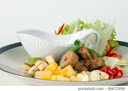Grilled pork balls with condiments and Peanut Sauce from top view 86672896