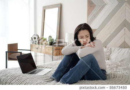 Young asian woman read bad news on laptop look desperate, feels stressed, important data loss, notice form bank about debt, upset user customer using laptop feel frustrated mad about computer problem Young asian woman read bad news on laptop look desperate, feels stressed, important data loss, notice form bank about debt, upset user customer using laptop feel frustrated mad about computer problem 86673480