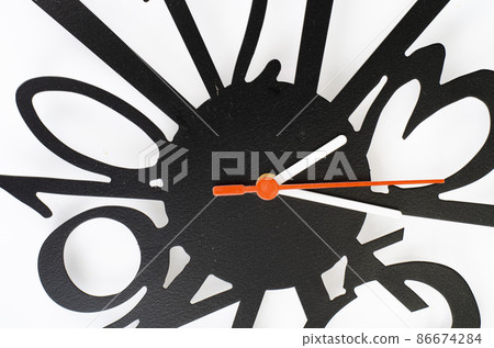 Hands and numbers, fragment of clock. Studio Photo 86674284