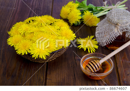 Floral delicious honey from dandelions. Studio Photo Floral delicious honey from dandelions. Studio Photo 86674607