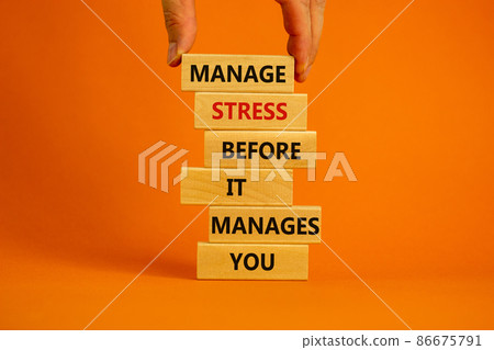 Stress management symbol. Wooden blocks with words manage stress before it manages you. Beautiful orange background. Doctor hand. Psychological, business and stress management concept. Copy space. Stress management symbol. Wooden blocks with words manage stress before it manages you. Beautiful orange background. Doctor hand. Psychological, business and stress management concept. Copy space. 86675791