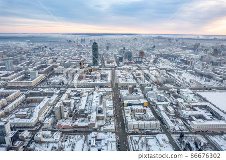 Yekaterinburg aerial panoramic view at Winter in cloudy day. Karl Liebknecht Street and Lenin Avenue. Yekaterinburg aerial panoramic view at Winter in cloudy day. Karl Liebknecht Street and Lenin Avenue. 86676302