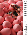 beauty background a bunch of pink gentle makeup sponges and a mirror vertical orientation 86676832