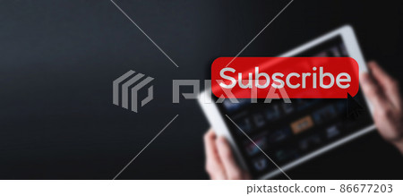 Subscribe banner. Online video subscription red button. Internet service on laptop digital tablet blured technology background. Social media concept. Streaming video. 86677203