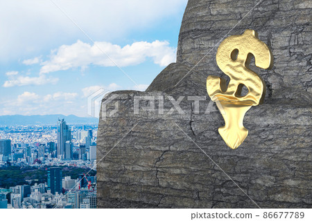 Down arrow and dollar mark on the cliff Down arrow and dollar mark on the cliff 86677789