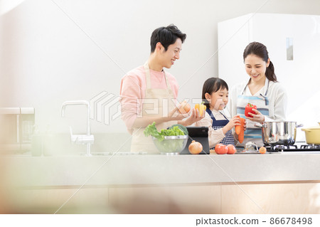 Home time: Family enjoying cooking Home time: Family enjoying cooking 86678498