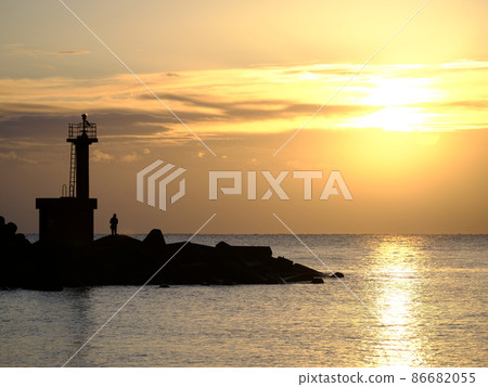 Hiwasa embankment lighthouse and angler 86682055