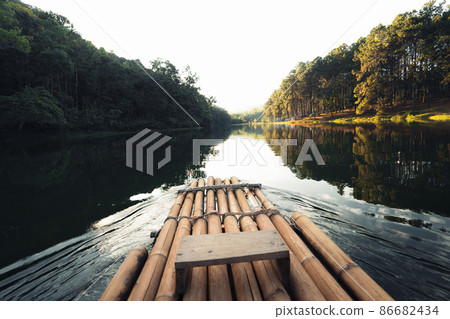 bamboo raft in the water, nature tourism 86682434