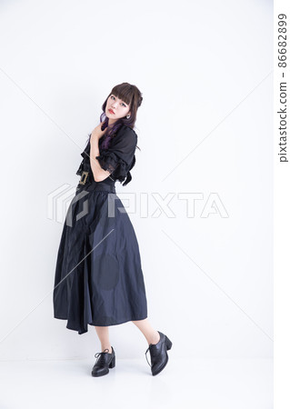 A woman who poses in a black dress Cosplay A woman who poses in a black dress Cosplay 86682899