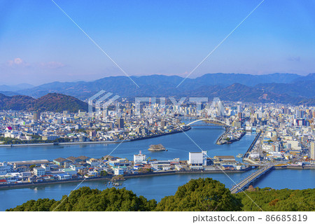 A panoramic view of Kochi city from Mt. Godai under a clear sky A panoramic view of Kochi city from Mt. Godai under a clear sky 86685819