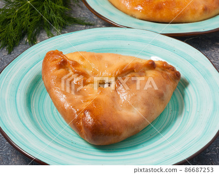 echpochmak is a traditional Tatar pie with potatoes and meat 86687253