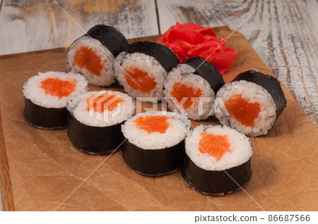 traditional Japanese cuisine. rice and salmon rolls 86687566