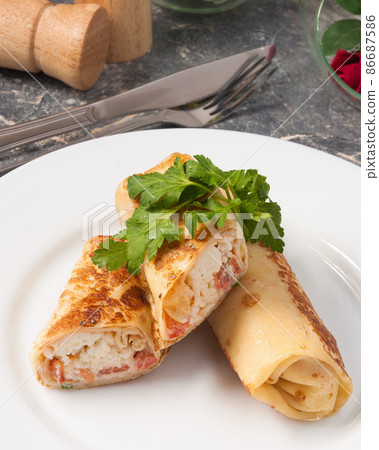 tasty toasted pancake with tomatoes and cheese tasty toasted pancake with tomatoes and cheese 86687586