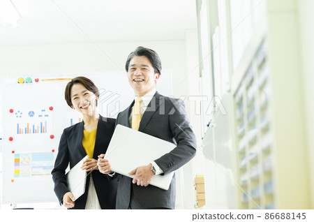 Office men and women smiles looking at the camera portrait 86688145