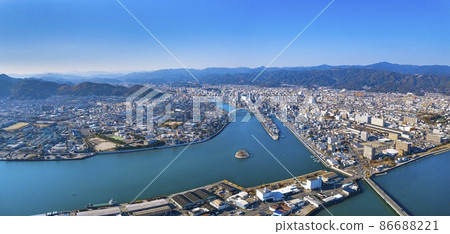 Drone aerial view: A panoramic view of Kochi city from Mt. Godai under the clear sky Drone aerial view: A panoramic view of Kochi city from Mt. Godai under the clear sky 86688221