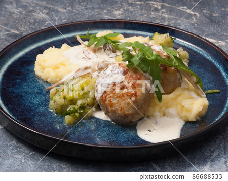 cutlets with mashed potatoes with cream sauce in the restaurant cutlets with mashed potatoes with cream sauce in the restaurant 86688533