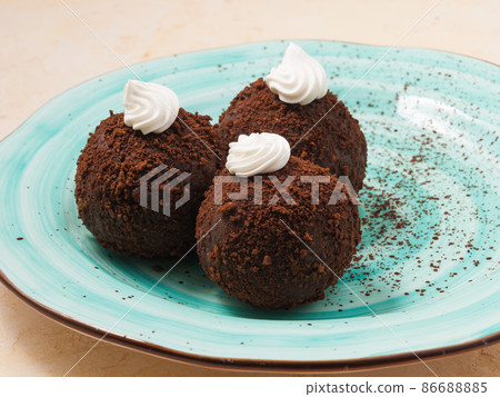 classic Russian chocolate cake potato decorated with cream classic Russian chocolate cake potato decorated with cream 86688885
