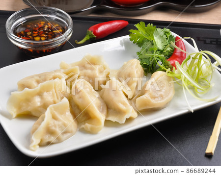 Chinese dumplings with shrimp, squid and pork Chinese dumplings with shrimp, squid and pork 86689244