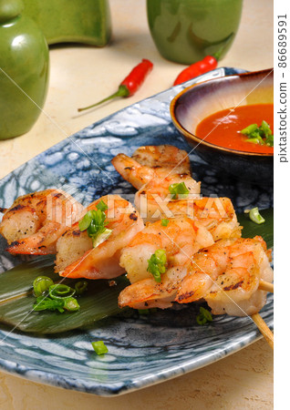 shrimp on skewers Asian cuisine. Vertical frame shrimp on skewers Asian cuisine. Vertical frame 86689591