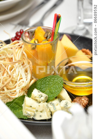 cheese platter in the restaurant. Close up cheese platter in the restaurant. Close up 86689592