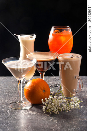 assorted popular alcoholic cocktails on a black background assorted popular alcoholic cocktails on a black background 86689614
